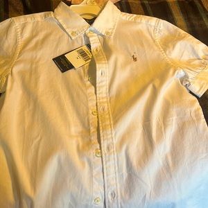 A brand new never worn white girls polo
